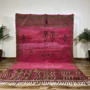 Handmade Moroccan Pink Berber Rug – Tribal Wool Rug with Green Symbols and Zigzag Border